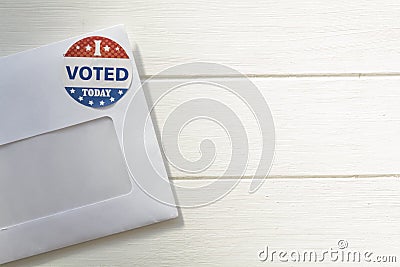 Envelope with voting ballot papers sent by mail for absentee vote in presidential election. Top view with copy space Editorial Stock Photo