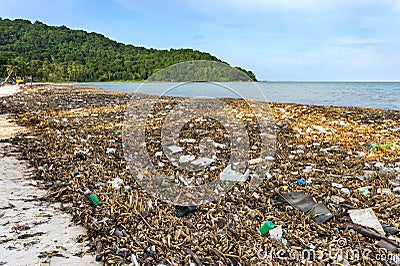 Environmental disaster. Garbage dump on Bai sao beach with white sand on the coastline. Plastic rubbish pollution in ocean.Plastic Stock Photo