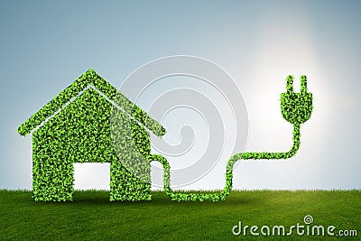 Environmentally friendly housing concept with green house - 3d r Stock Photo