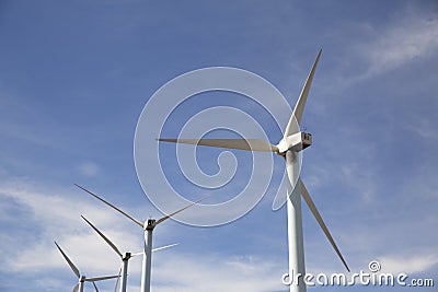 Eolic wind Turbines on a modern windmill farm Stock Photo