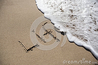 Written in the sand, ephemeral 'life'. Stock Photo