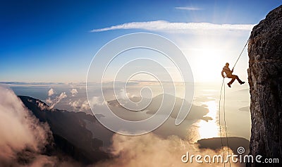 Epic Adventurous Extreme Sport Composite of Rock Climbing Stock Photo