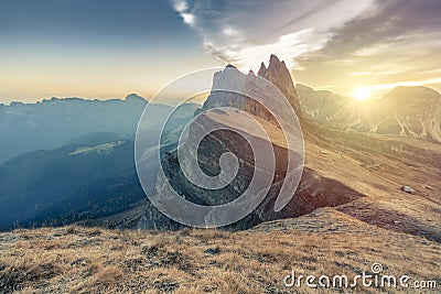 Epic Misty Morning Landscape of Dolomites Alps. Majestic Seceda Peak Tyrol, Italy, Europe Stock Photo