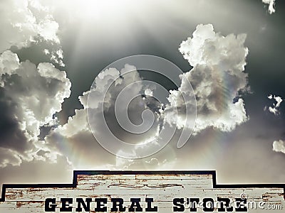 Epic sky, sun shines down on general store Stock Photo