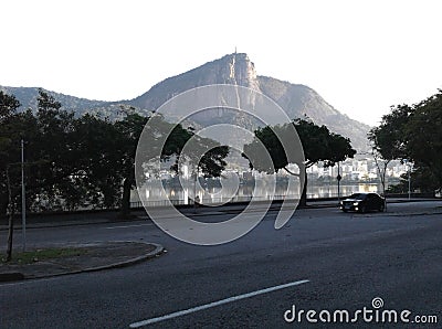 Epitacio pessoa avenue, lagoon, mountains and buildings around Rodrigo de Freitas Lagoon Rio de Janeiro Brazil Stock Photo