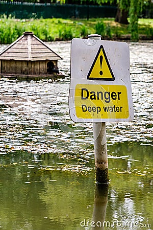 Danger Deep Water Public Warning Sign At A Lake Or Pool Stock Photo