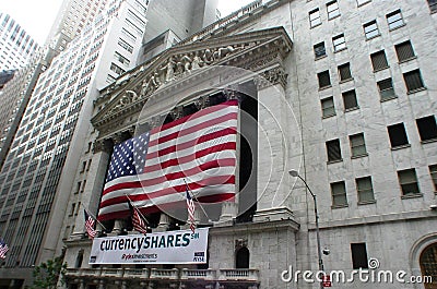 The New York Stock Exchange with American Flag Editorial Stock Photo