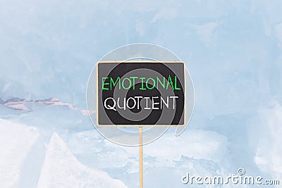 EQ emotional quotient symbol. Concept words EQ emotional quotient on beautiful yellow black blackboard. Beautiful blue ice Stock Photo