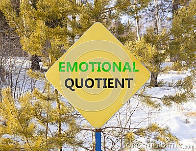 EQ emotional quotient symbol. Concept words EQ emotional quotient on beautiful yellow road sign. Beautiful forest snow sky Stock Photo