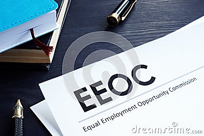 Equal Employment Opportunity Commission EEOC document and pen on a table Stock Photo