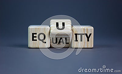 Equality or equity symbol. Turned a cube and changed the word `equality` to `equity`. Beautiful grey background. Psychology, Stock Photo