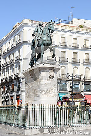 The equestrian statue of Charles III stands in Madrid's Puerta del Sol. Madrid, Spain Editorial Stock Photo
