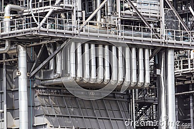 Equipment, cables and piping as found inside of industrial power plant Editorial Stock Photo