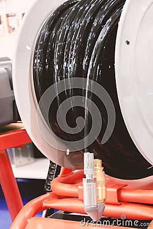 Equipment for cleaning and unblocking main and domestic sewer pipes with a high pressure hose Stock Photo