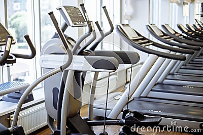 Equipment And Machines At The Modern Gym Room Fitness Center. Stock Photo