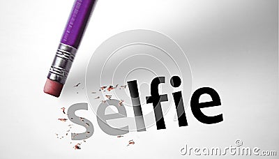 Eraser deleting the word Selfie Stock Photo