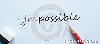 Erasing IMPOSSIBLE text change to POSSIBLE. challenge, positive thinking and success concept Stock Photo