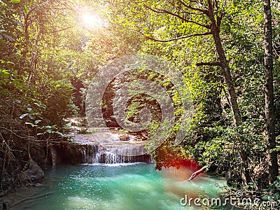 Erawan Waterfall in Kanchanaburi, Thailand. Landscape of Waterfall Crashing Big Stone on The Clear Natural Water in The Jungle Stock Photo