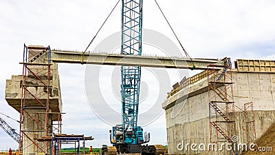 Erection girder process using a crane Stock Photo