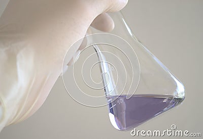 Erlenmeyer flask blue liquid Stock Photo