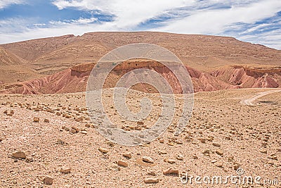 Eroded red cuestas with deep crevasses Stock Photo