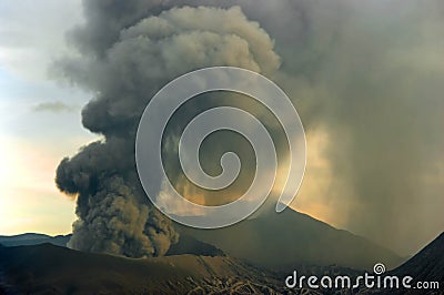 Eruption of Mount Bromo at sunset . Stock Photo