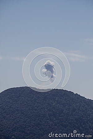 Eruption of volcano Fuego hidden behind volcan Toliman, Guatema Stock Photo