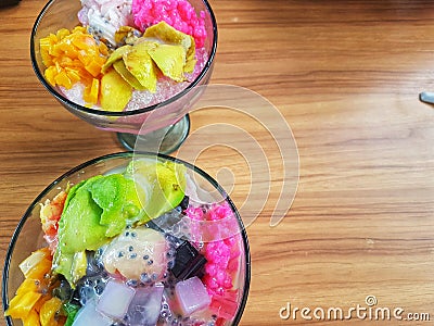 Es teler - a homemade iced fruit cocktail from Indonesia. It is made from alpukat avocado, kelapa muda young coconut meat Stock Photo