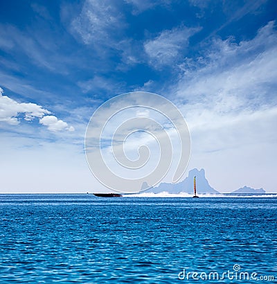 Es Vedra Ibiza silhouette with boats Formentera view Stock Photo
