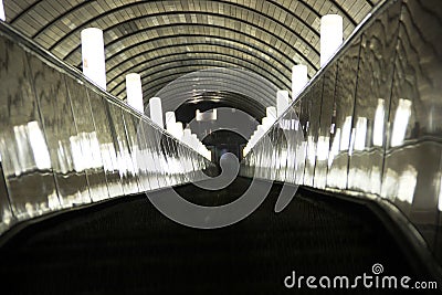 Escalator in the metro. lights on the escalator of the city subway Stock Photo