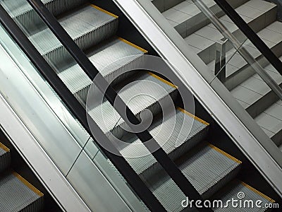 Escalator in shopping mall Stock Photo