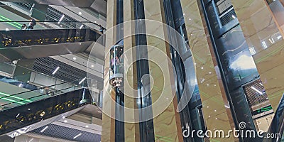 Escalators and elevators at the mall Stock Photo