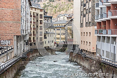 River Valira on Engordany Bridge and houses view in a snowfall day in small town Escaldes-Engordany in Andorra on January 16, 201 Editorial Stock Photo