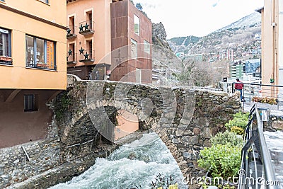 River Valira on Engordany Bridge and houses view in a snowfall day in small town Escaldes-Engordany in Andorra on January 16, 201 Editorial Stock Photo