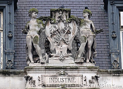 Escutcheon representing the industry, on the back of the Hotel de Ville, City Hall in Paris Stock Photo