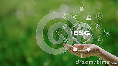 ESG icon concept in the woman hand for environmental, social, and governance by using technology of renewable resources to reduce Stock Photo