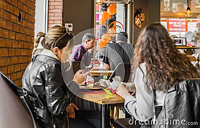 Eskisehir, Turkey - April 15, 2017: Friends sitting in cafe shop Editorial Stock Photo