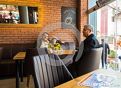 Eskisehir, Turkey - April 15, 2017: People sitting in a cafe shop Editorial Stock Photo