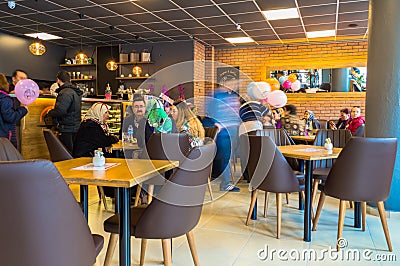 Eskisehir, Turkey - April 15, 2017: People sitting in a cafe shop Editorial Stock Photo