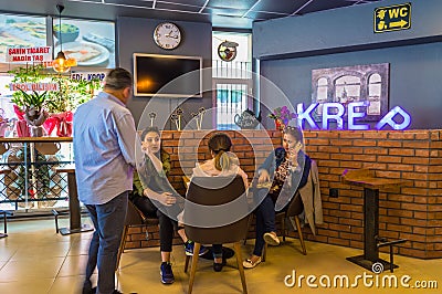 Eskisehir, Turkey - April 15, 2017: People sitting in a cafe shop Editorial Stock Photo