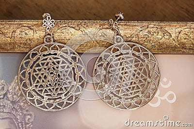 Esoteric earrings Stock Photo