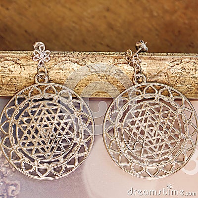 Esoteric earrings Stock Photo