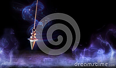 Esoteric And Hypnosis Concept-Pendulum Swinging Stock Photo