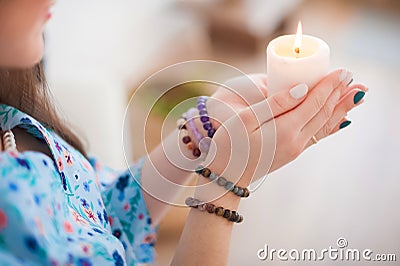 Esoteric in a magic candle close-up and copy space. Fortune telling by a candle Stock Photo