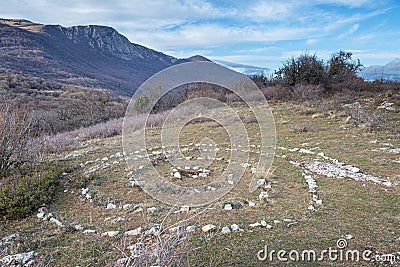 Esoteric place of power - spiral laid out of stones on the top of Paragilmen Mountain Stock Photo