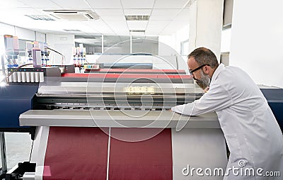 Espertise man in transfer printing industry plotter Stock Photo
