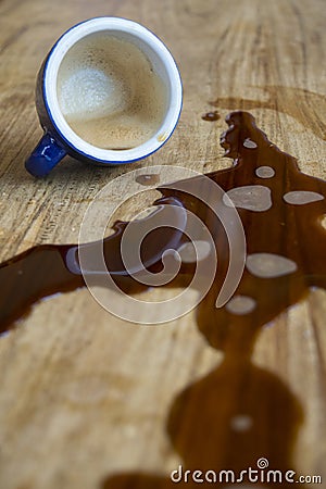 Espresso coffee spilt on table Stock Photo