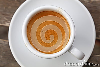 Espresso coffee in white cup close up top view Stock Photo