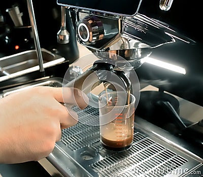 Espresso from espresso machine Stock Photo