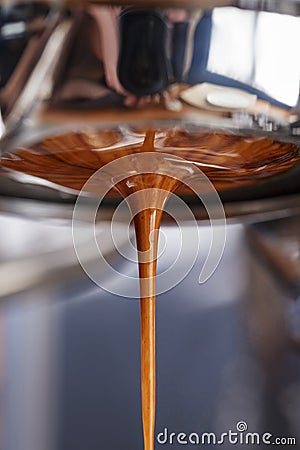 Espresso extraction with bottomless portafilter Stock Photo